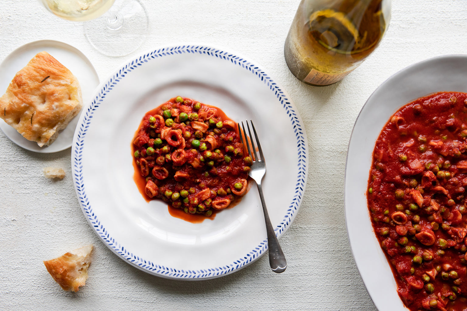 calamari with peas and bionaturae strained tomatoes
