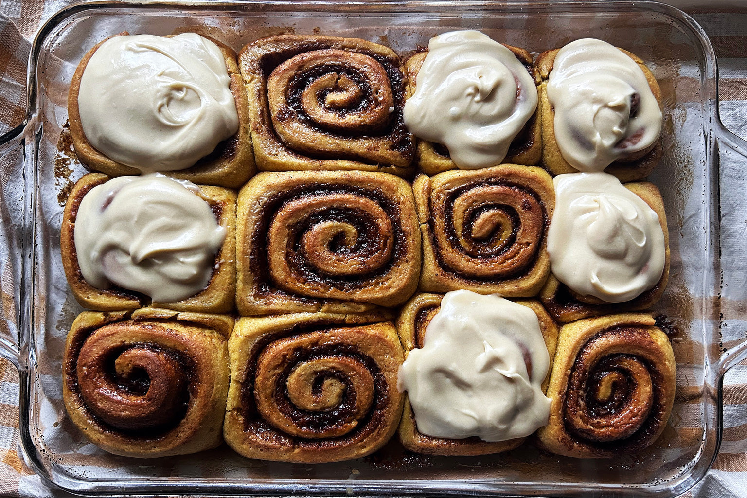 Einkorn Sourdough Pumpkin Cinnamon Rolls with Maple Cream Cheese Frosting