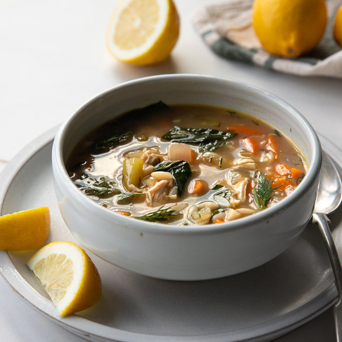 Bowl of Lemon Chicken orzo soup with Jovial Brown Rice Orzo