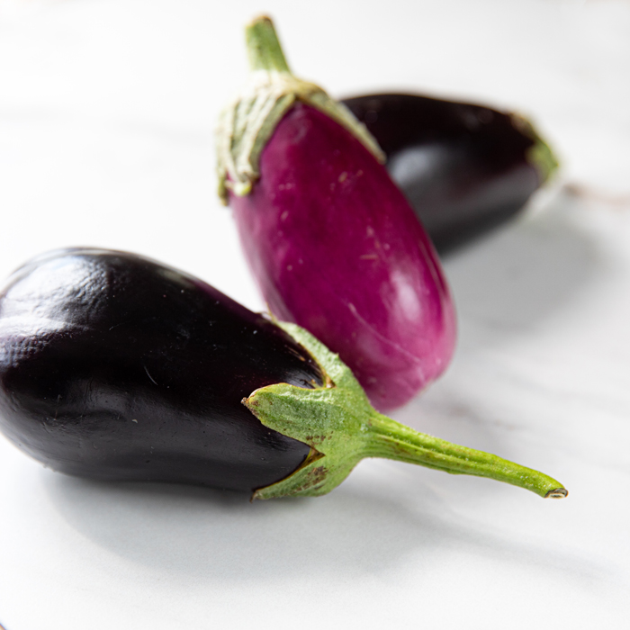 Scarlet Eggplant Some Cut Half Stock Photo by ©flanovais 390412778